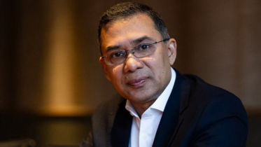 Why does Tarique Rahman need a ’travel pass’ to come home?