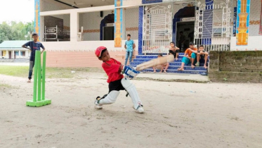 Three and a half year old cricketer Isa shakes the field