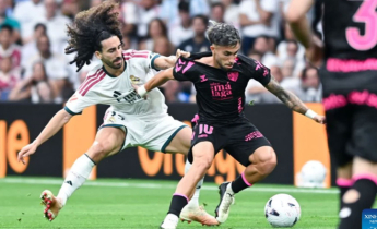 Real Madrid thrash Malaga 4-0 to maintain perfect start