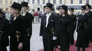 PhD in Finland requires a hat and a sword, why?