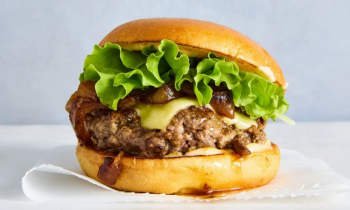 McDonald’s C.E.O. Takes a Big Bite Out of a Burger.