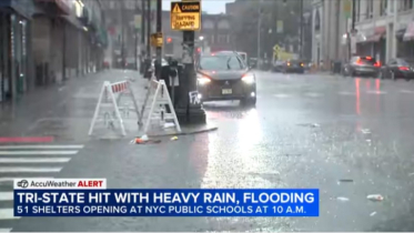 Flash flood threat grows as NYC opens shelters