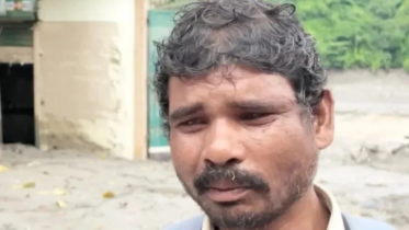Only son missing in flood